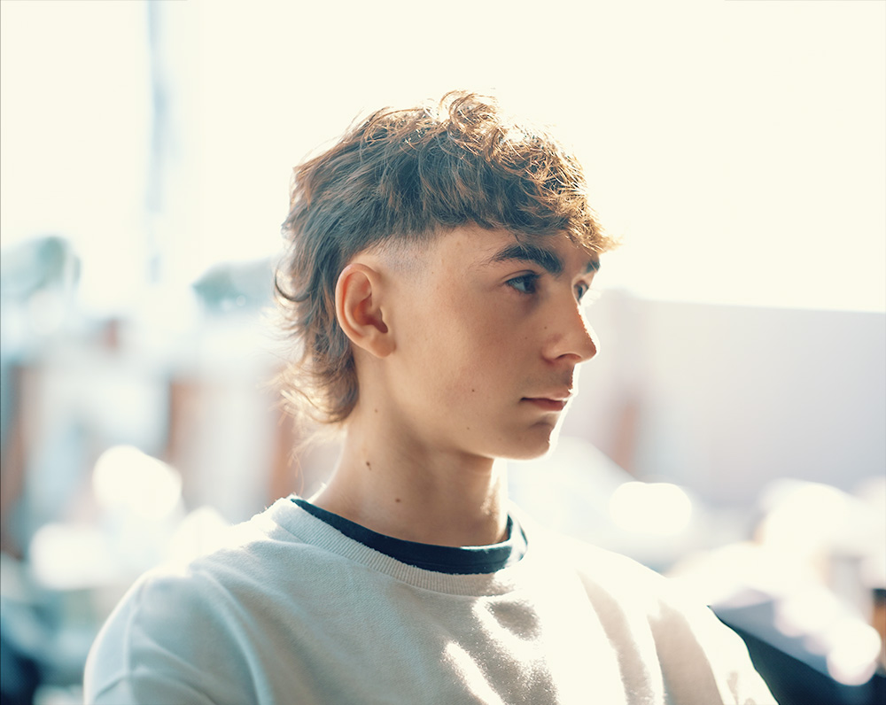 Premium Photo | A model with a short spiky haircut in electric blue  portraying boldness and individuality